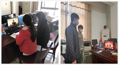 学校值班人员在办公室聆听授课